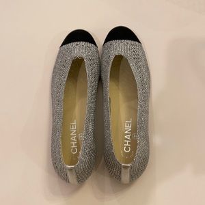 Silver and black Chanel loafers